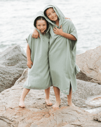 Terra Hooded Poncho Youth – Teal Blue